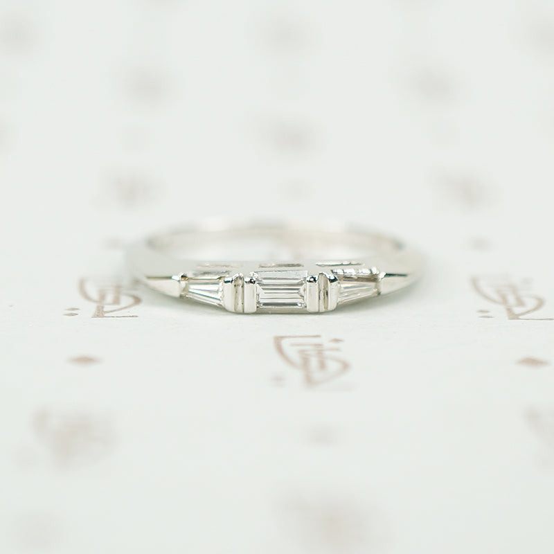 classic 1950's platinum and 3 baguette diamond band