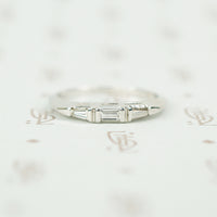 classic 1950's platinum and 3 baguette diamond band