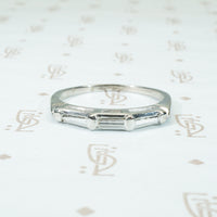 three baguette diamond band in platinum circa 1940