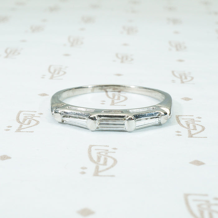 three baguette diamond band in platinum circa 1940