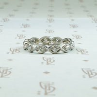 Platinum and diamond eternity band eye shaped vintage 1930's