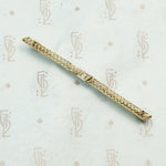 14k gold whiplash filigree bar brooch set with a diamond1920's