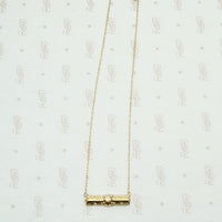 Repoussé Gold Bar Pendant Necklace