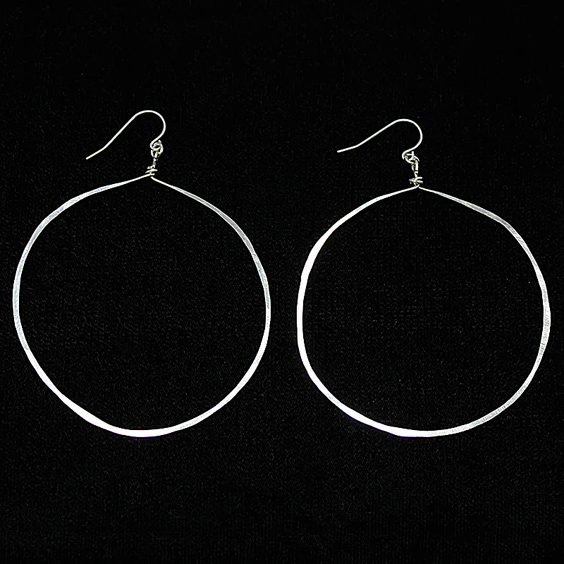 Artisan Hammered Silver Hoop Earrings by Brin
