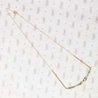 Turquoise & Brass Bead Arc Necklace by Brin