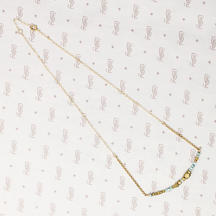 Turquoise & Brass Bead Arc Necklace by Brin