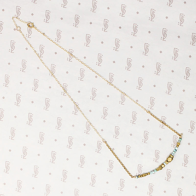 Turquoise & Brass Bead Arc Necklace by Brin