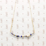 Vivid Blue Lapis & Brass Bead Arc Necklace by Brin