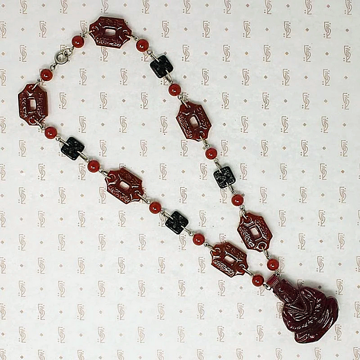 Dramatic Pressed Glass Buddha Necklace