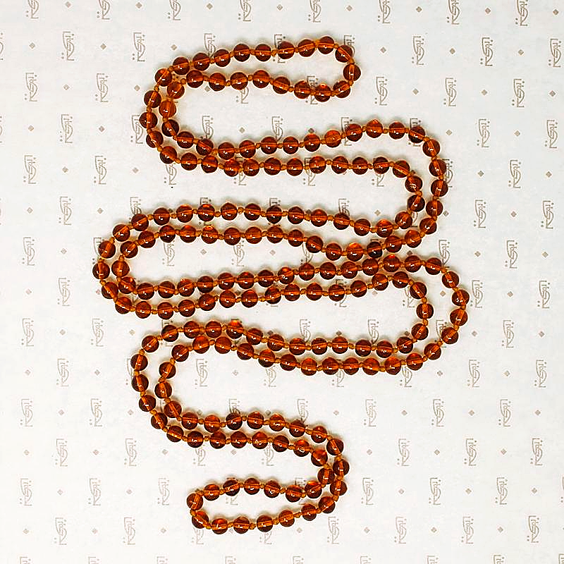 Long Strand of English Moulded Glass Beads