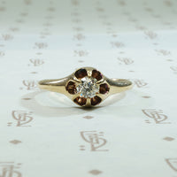 14k yellow gold .30ct old european cut diamond in a beautifully bloomed belcher setting circa 1880