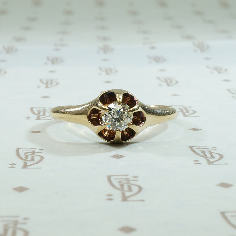 14k yellow gold .30ct old european cut diamond in a beautifully bloomed belcher setting circa 1880