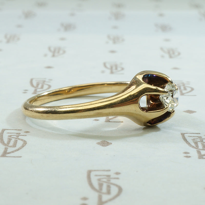 14k yellow gold .30ct old european cut diamond in a beautifully bloomed belcher setting circa 1880