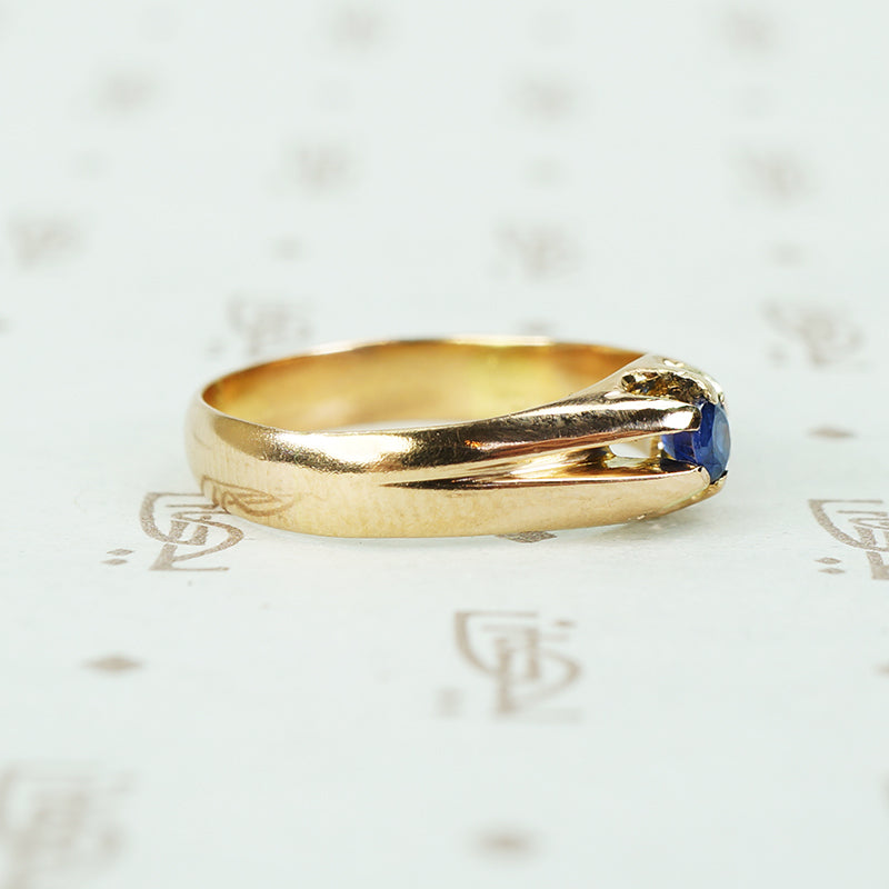 1/4 carat cornflower blue natural sapphire in 12k rose gold belcher circa 1880