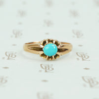 9ct rose gold belcher setting with oval turquoise ring