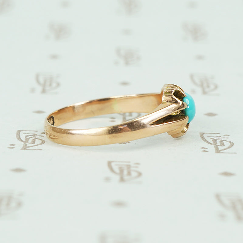 9ct rose gold belcher setting with oval turquoise ring side view 