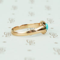 9ct rose gold belcher setting with oval turquoise ring side view 