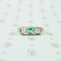 belias white gold filigree 3 stone ring emerald and diamond