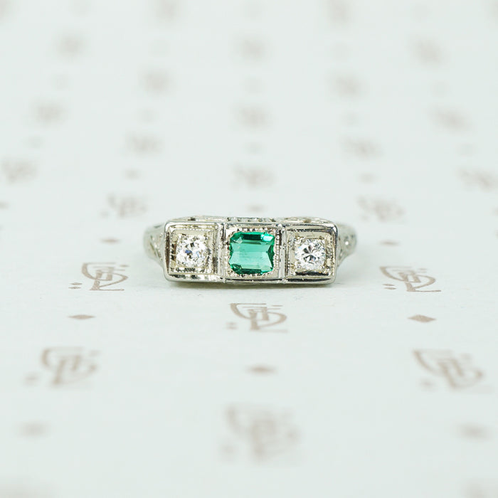 belias white gold filigree 3 stone ring emerald and diamond