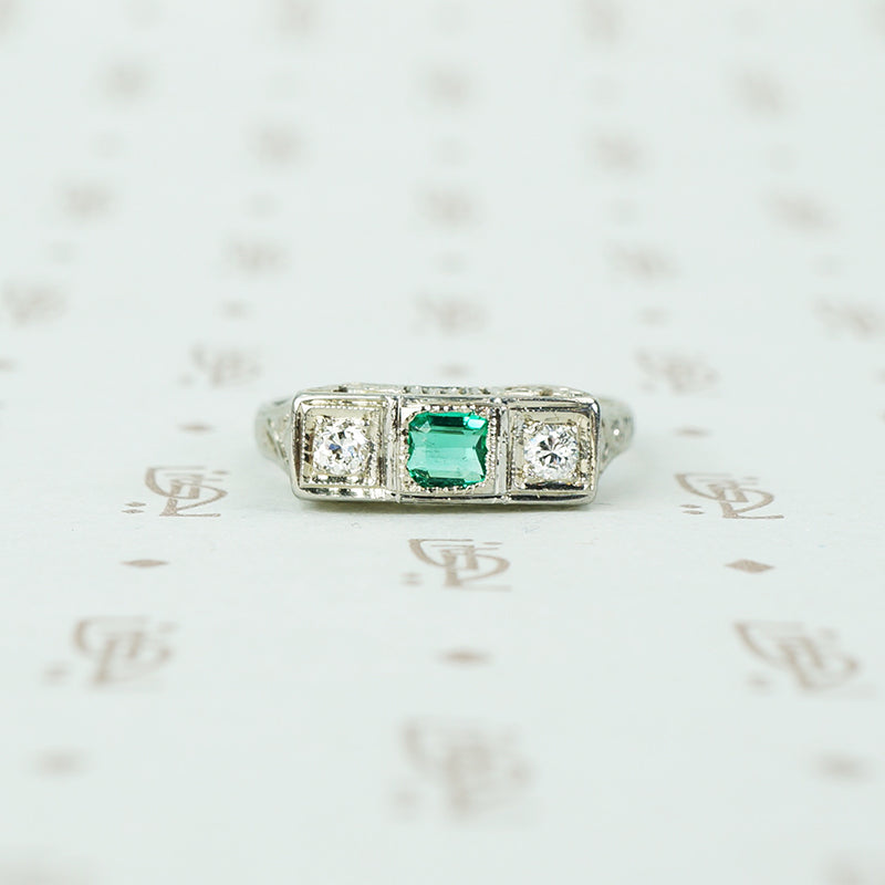 belias white gold filigree 3 stone ring emerald and diamond