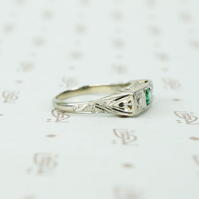 belias white gold filigree 3 stone ring emerald and diamond side view