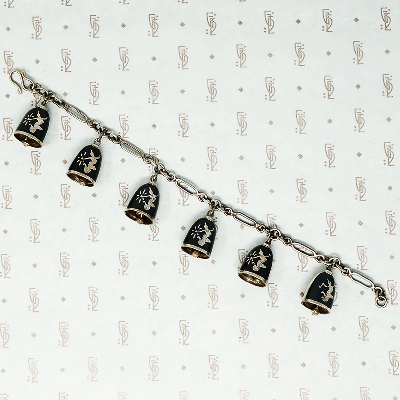 siam silver bell charm bracelet