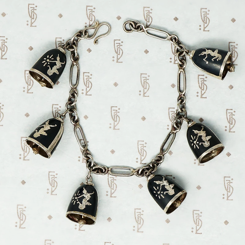 siam silver bell charm bracelet