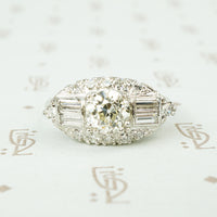 1930's pave set platinum and diamond oval east west ring