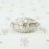 1930's pave set platinum and diamond oval east west ring