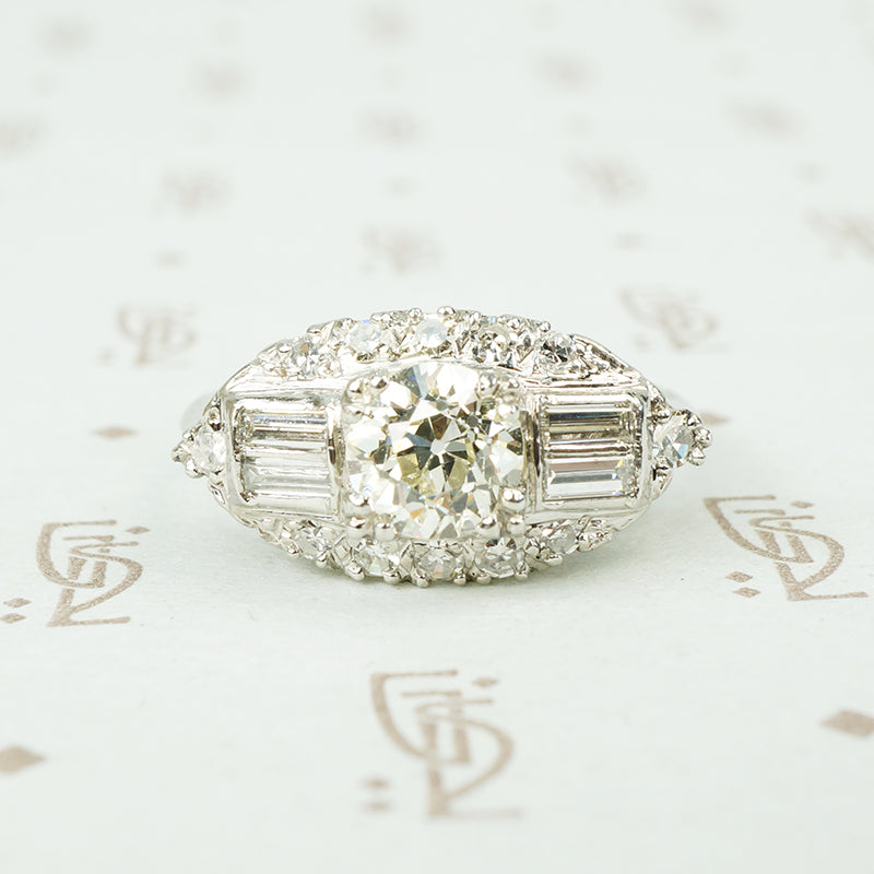 1930's pave set platinum and diamond oval east west ring