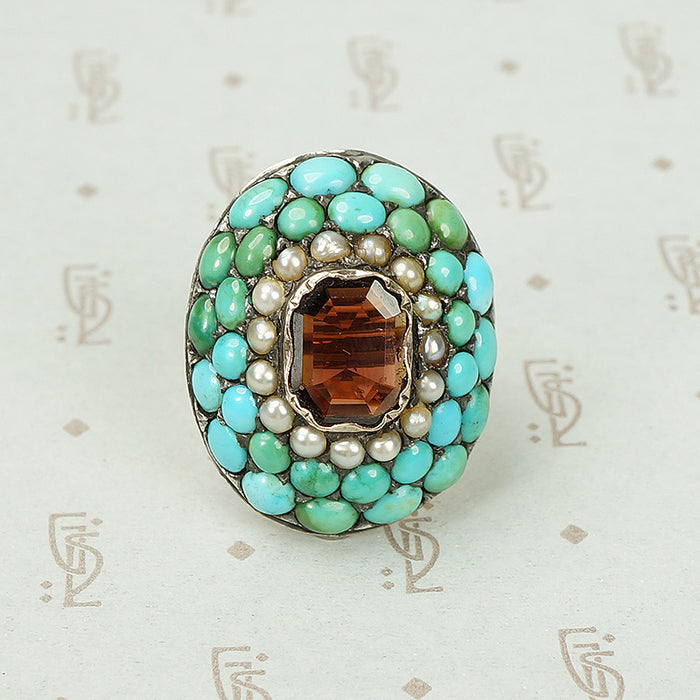 Impressive Pavé Turquoise and Table Cut Garnet Ring