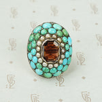 Impressive Pavé Turquoise and Table Cut Garnet Ring