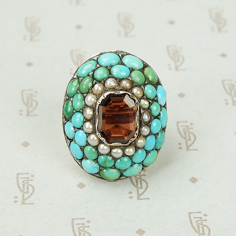 Impressive Pavé Turquoise and Table Cut Garnet Ring