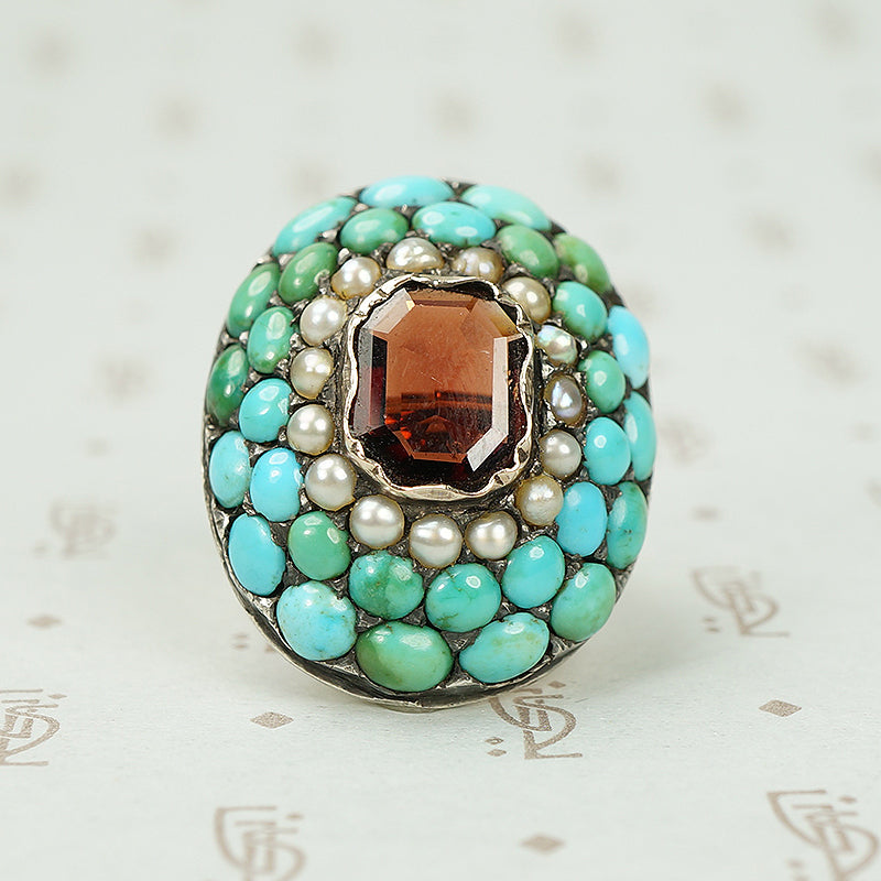 Impressive Pavé Turquoise and Table Cut Garnet Ring
