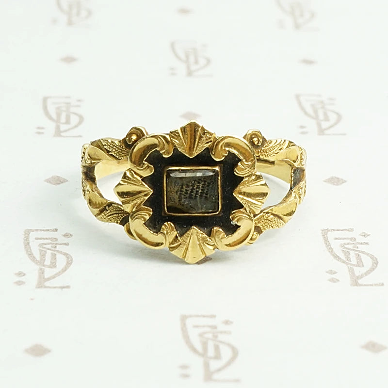 Exquisite 18k gold and enamel early Victorian mourning ring.