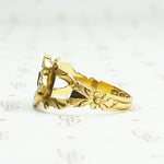 Exquisite 18k gold and enamel early Victorian mourning ring. Left side view.