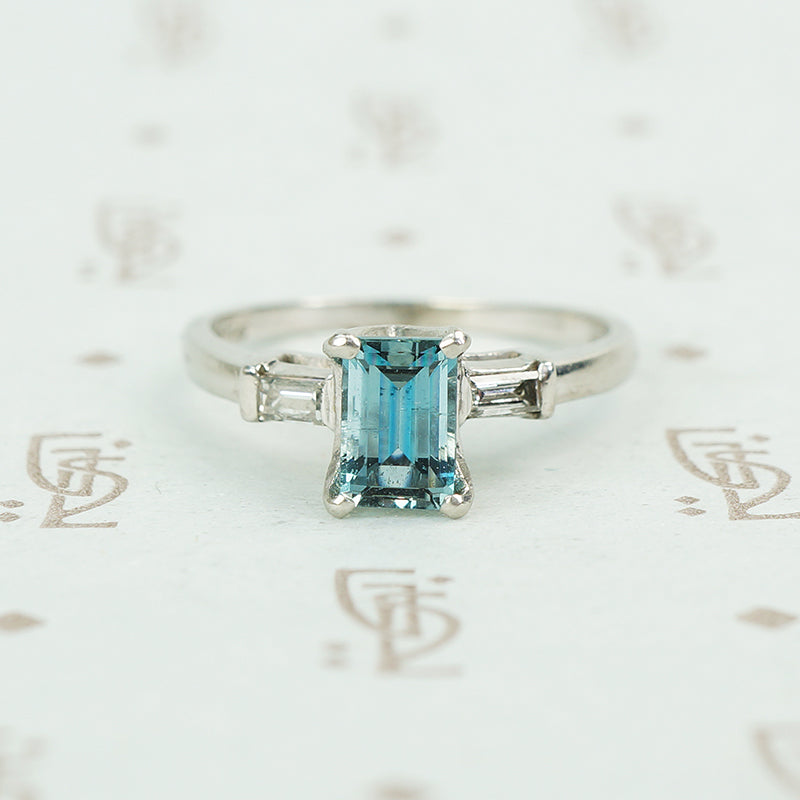 emerald cut aquamarine with baguette diamond sides in platinum