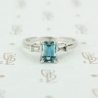 emerald cut aquamarine with baguette diamond sides in platinum