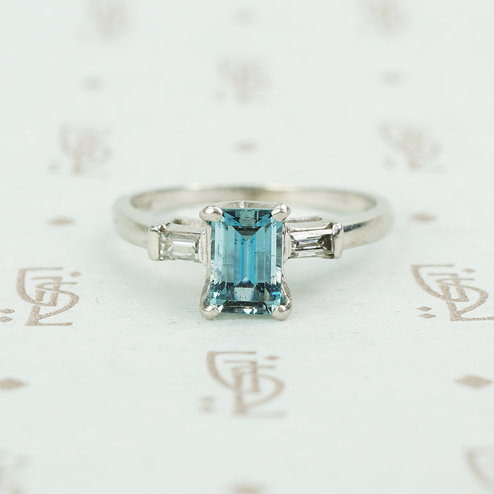 emerald cut aquamarine with baguette diamond sides in platinum