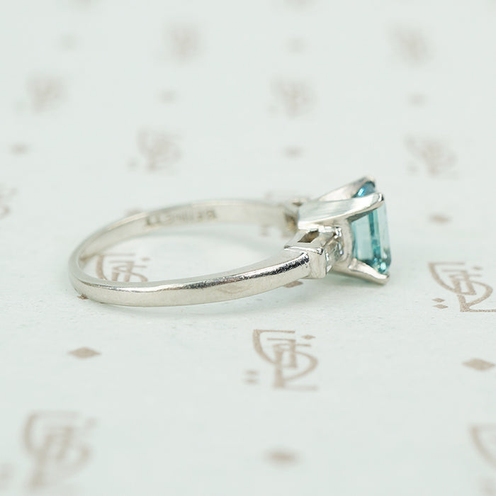 emerald cut aquamarine with baguette diamond sides in platinum side view