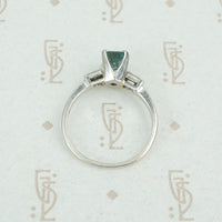 emerald cut aquamarine with baguette diamond sides in platinum top view