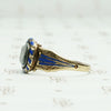 Georgian royal blue enamel and gold mourning ring. Left view.