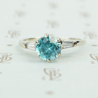 14k white gold natural blue zircon and baguette diamond engagement ring