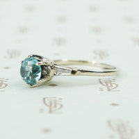 14k white gold natural blue zircon and baguette diamond engagement ring side details