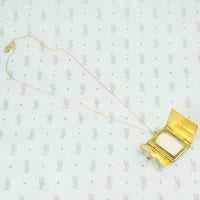 antique gold book locket opened