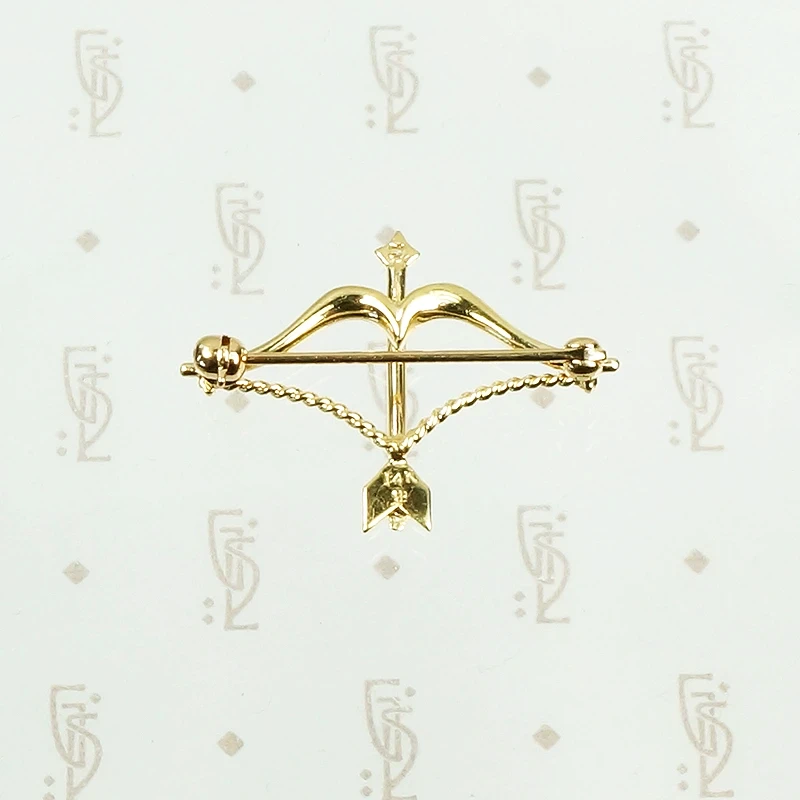 Delightful Gold Bow and Arrow Brooch