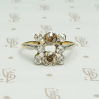 platinum on 18k yellow gold set with cognac colored  and white omc diamonds