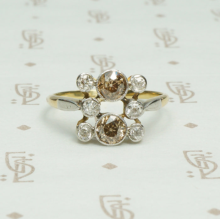 platinum on 18k yellow gold set with cognac colored  and white omc diamonds