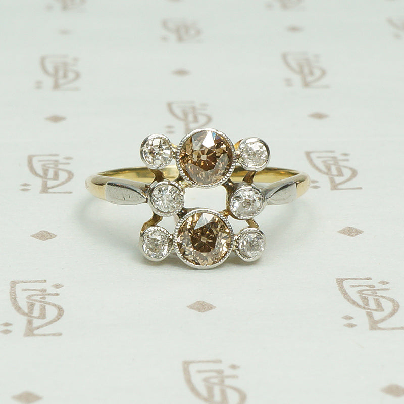 platinum on 18k yellow gold set with cognac colored  and white omc diamonds