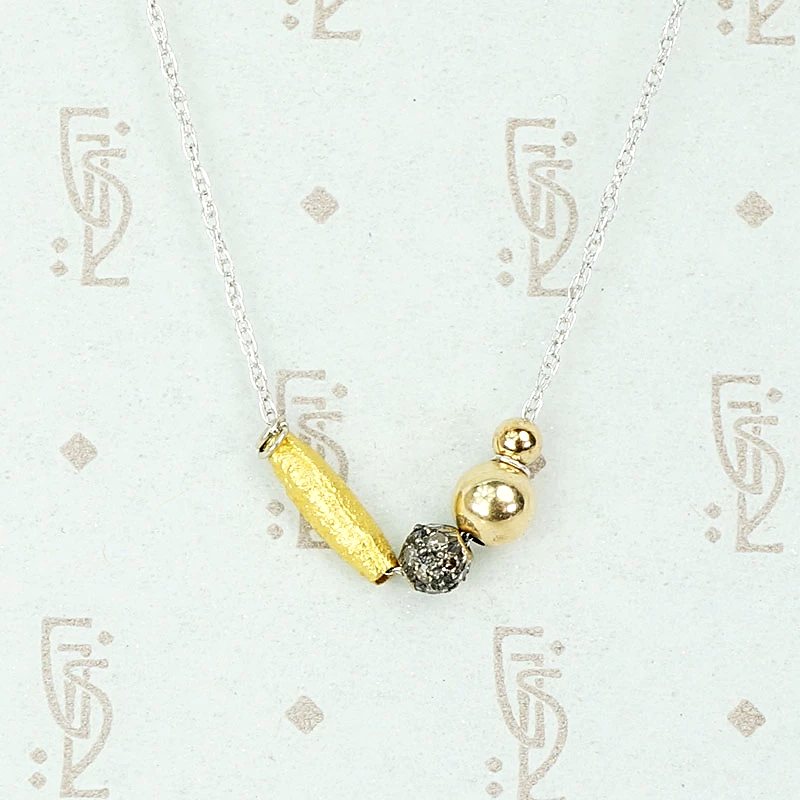 Gold and Diamond Bead Necklace by brunet